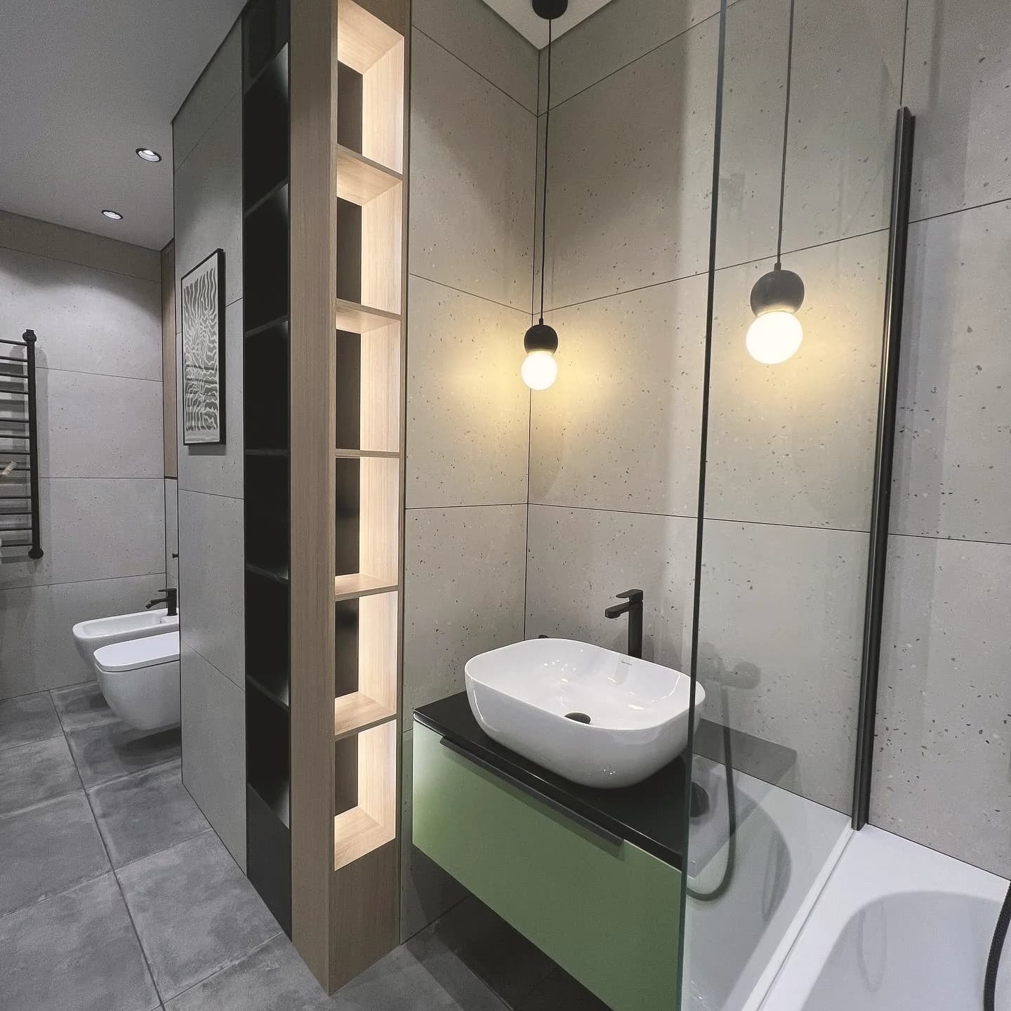 Olive-green vanity with lit niche column — London