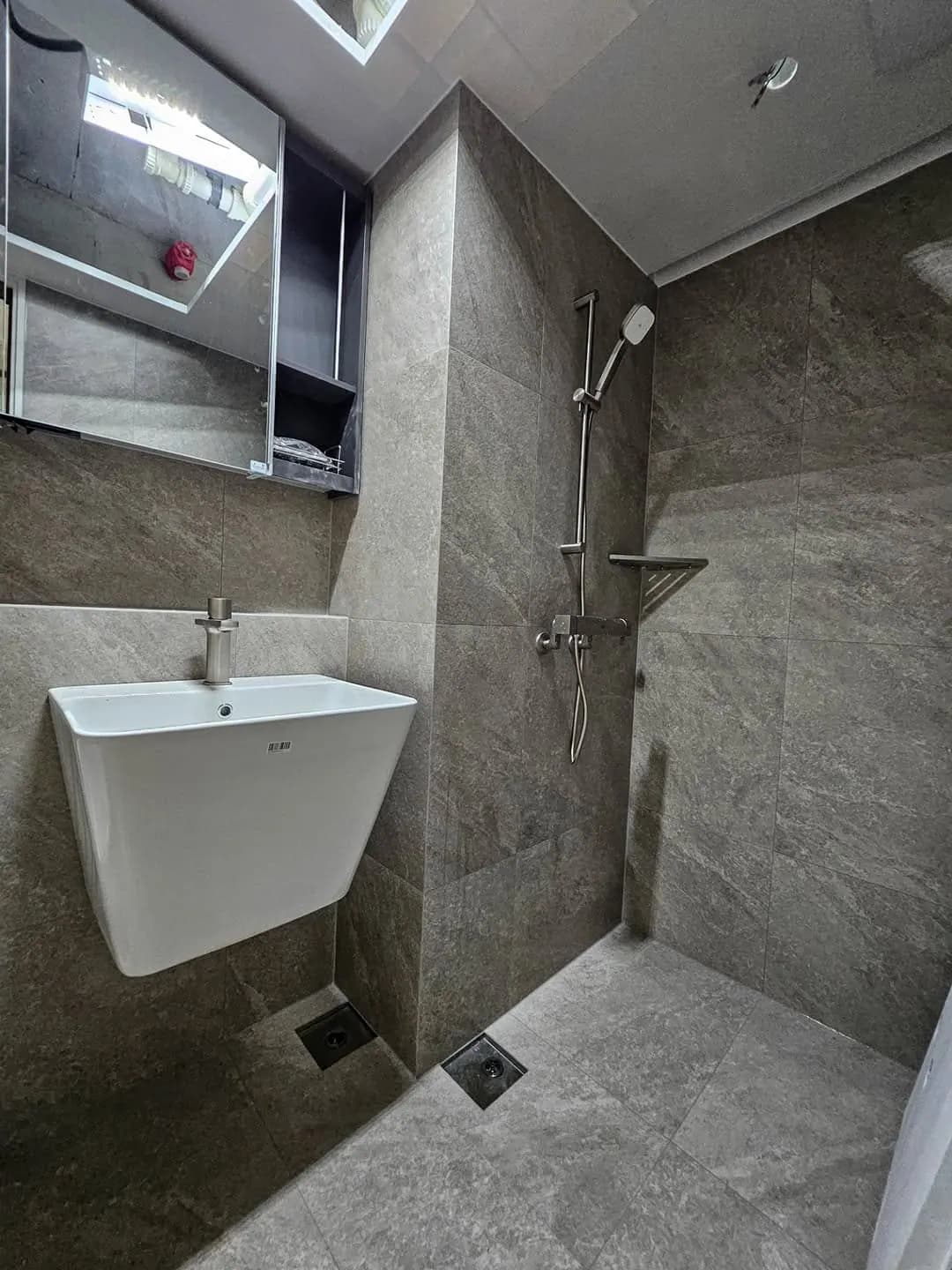Stone-grey wet room & shower refit — Ilford, Essex