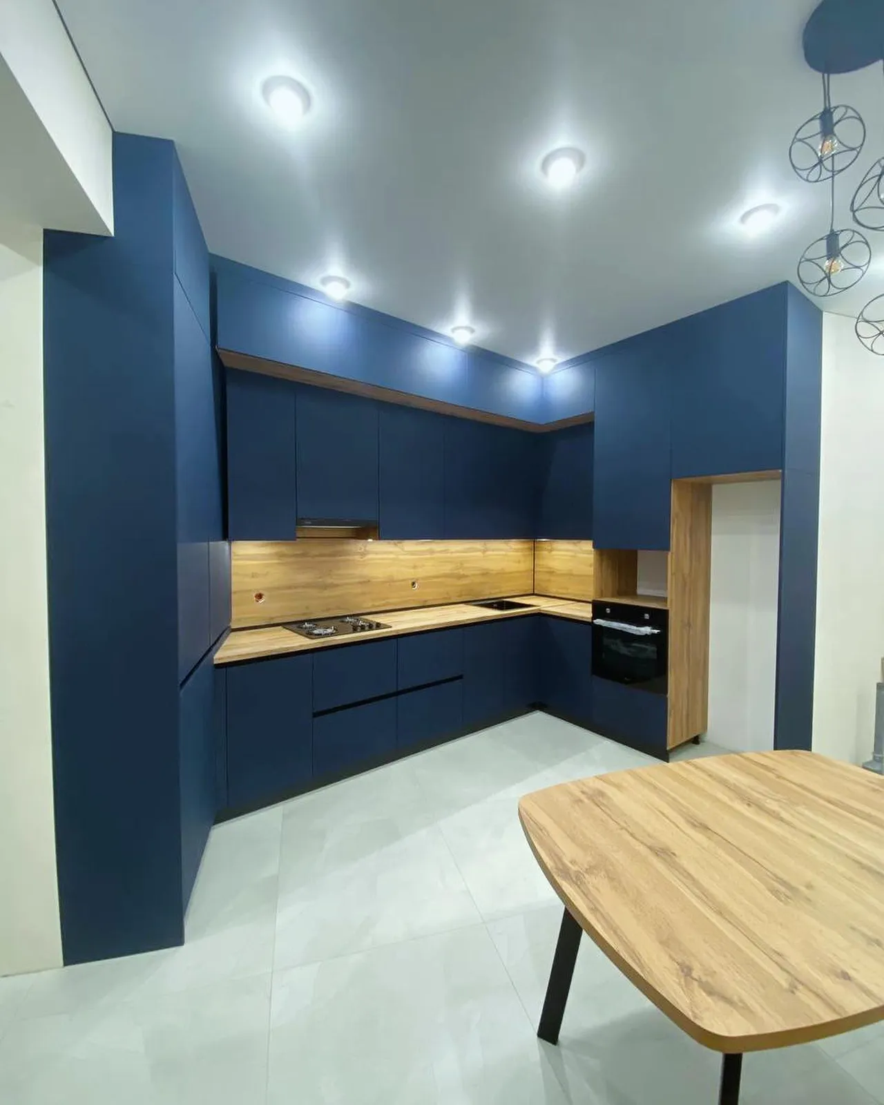 Navy kitchen with butcher-block worktops — Walthamstow, London