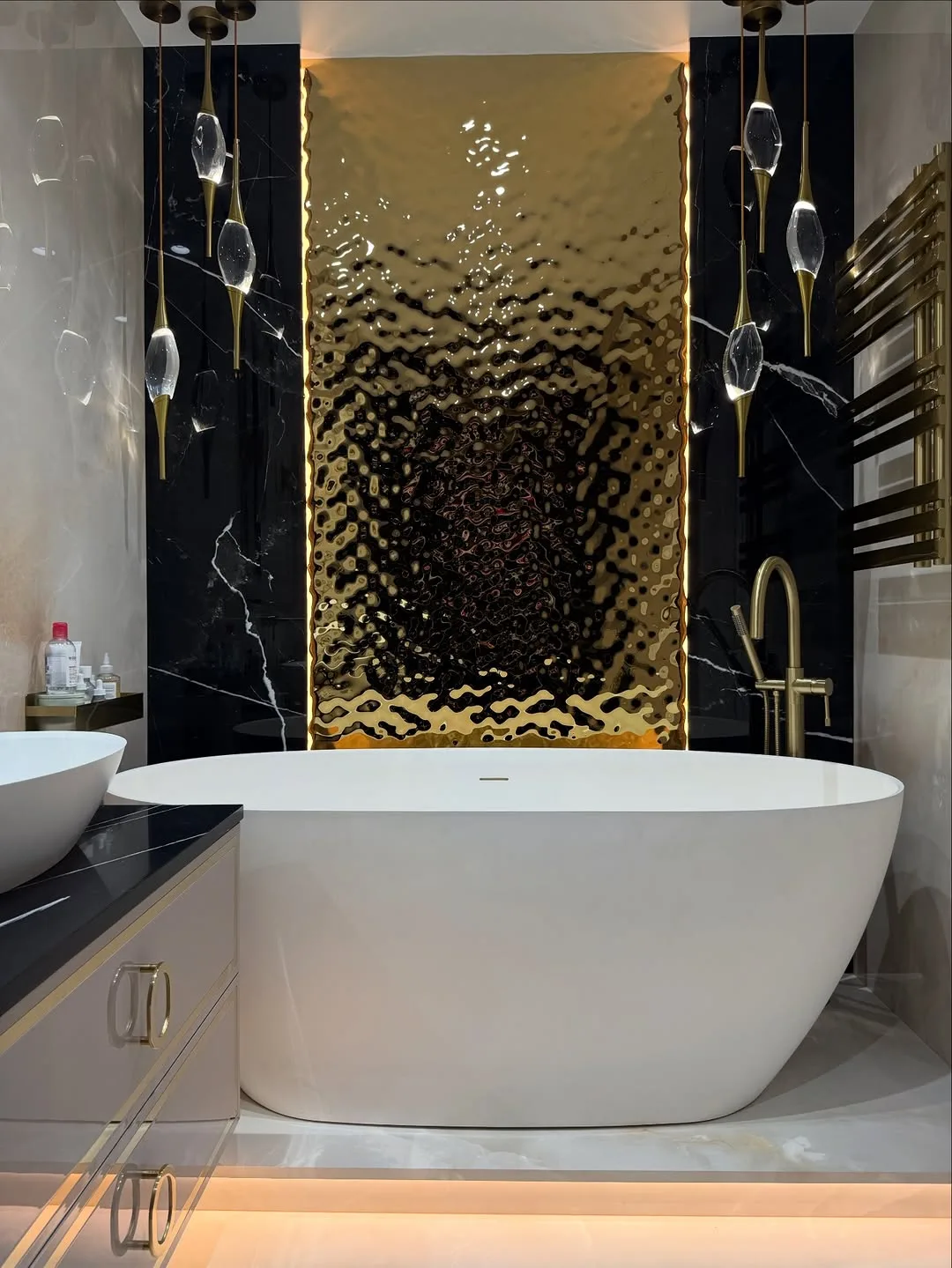 Gold-panel spa bathroom with freestanding bath — St John's Wood, London