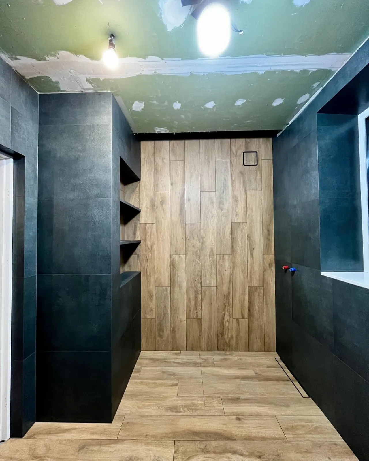 Wood-effect floors with charcoal feature walls — Waltham Abbey, Essex