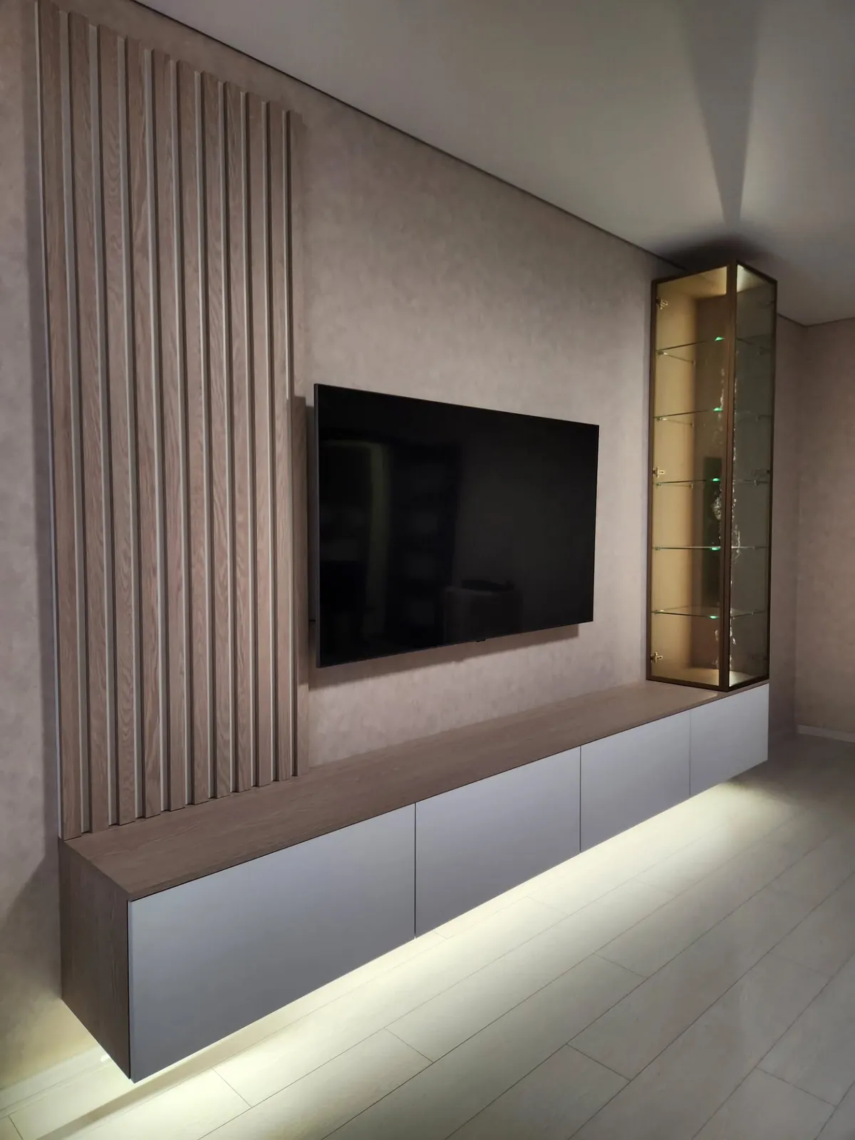 Oak-slat media wall with display cabinet — Chislehurst, London