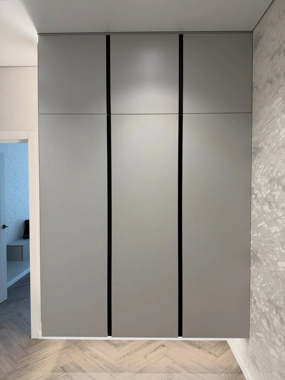 Grey wardrobes with LED shadow-gap reveal — Southgate, London