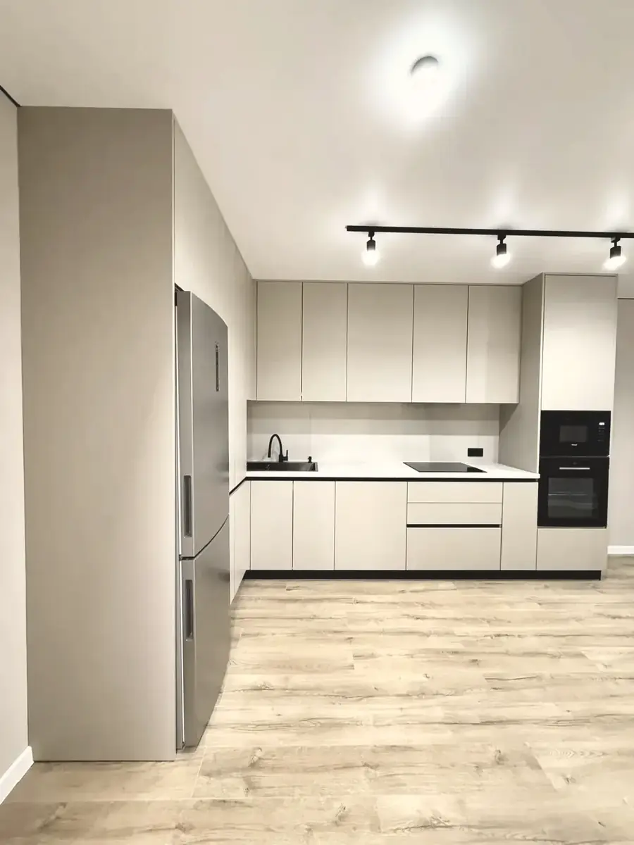 Greige matt kitchen with white stone worktops — Enfield, London