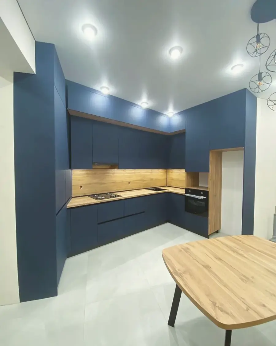 Navy kitchen with butcher-block worktops — Walthamstow, London