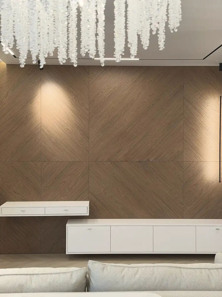 Walnut chevron wall with floating media units — London